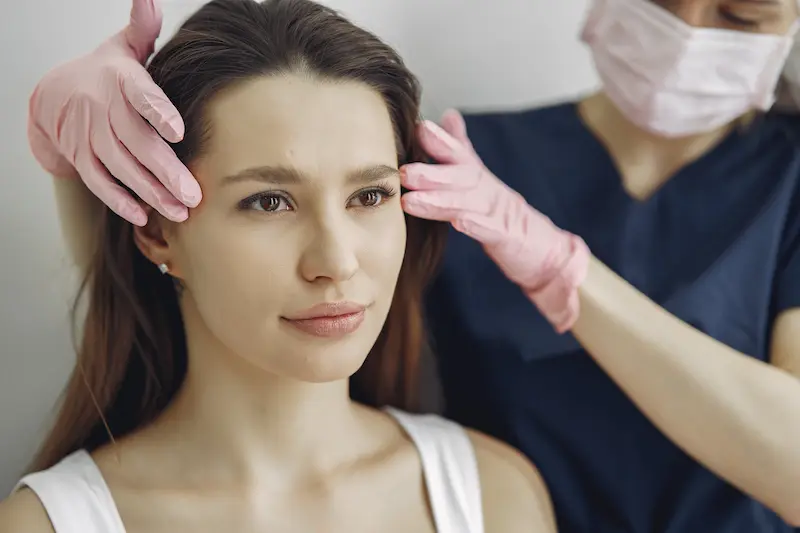 Woman With Microblading Getting Her Botox Done